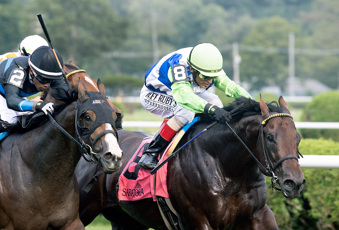 Arrest Me Red (right) wins the Mahony Stakes at Saratoga Race Course