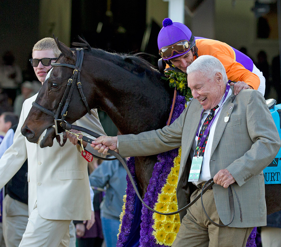 B. Wayne Hughes with Court Vision and Robby Albarado after winning the 2011 Breeders' Cup Mile