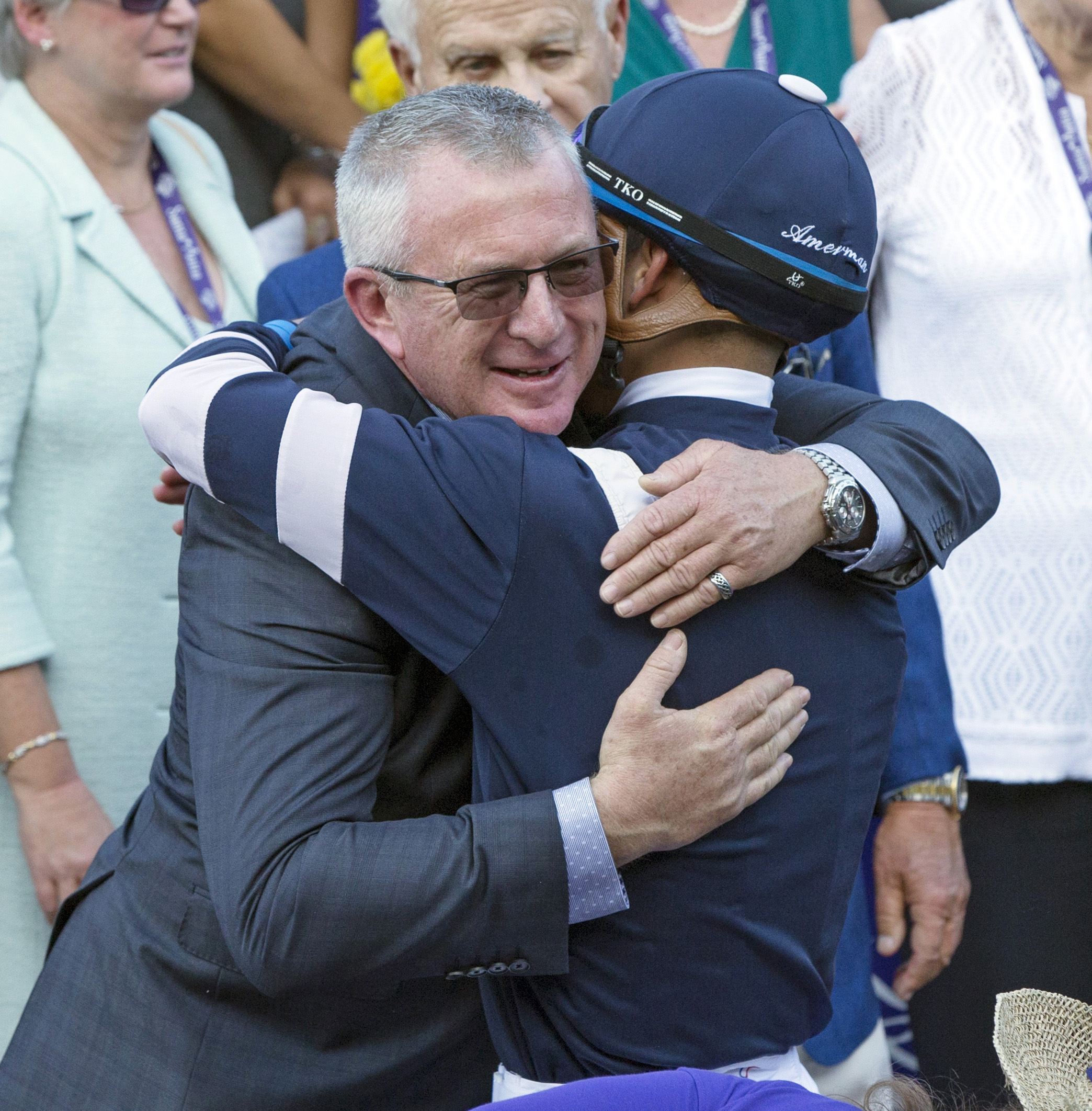Trainer Brian Lynch hugs Jose Ortiz after winning the Breeders' Cup Juvenile Turf