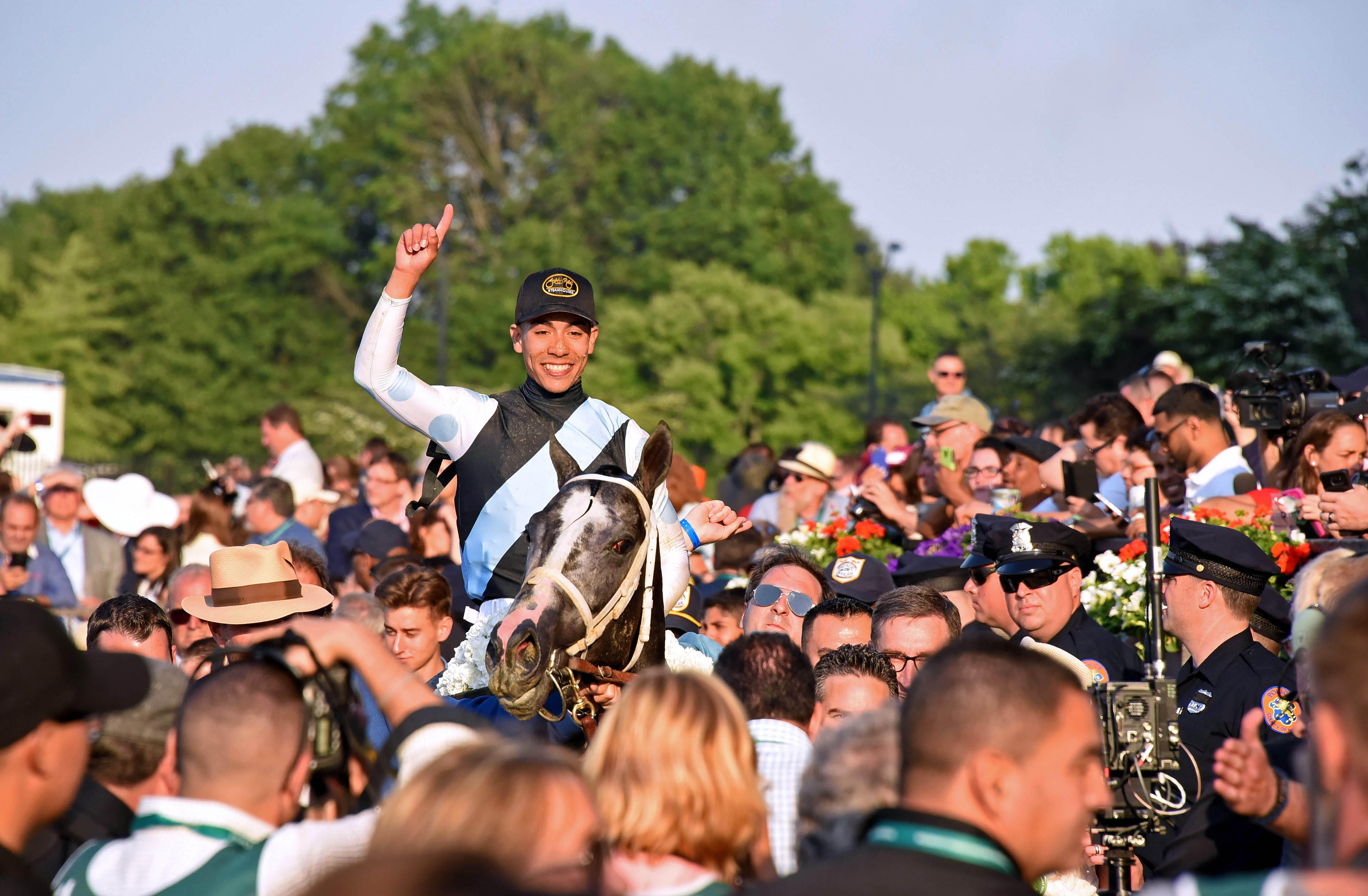 Jose Ortiz aboard Tapwrit after the 2017 Belmont Stakes