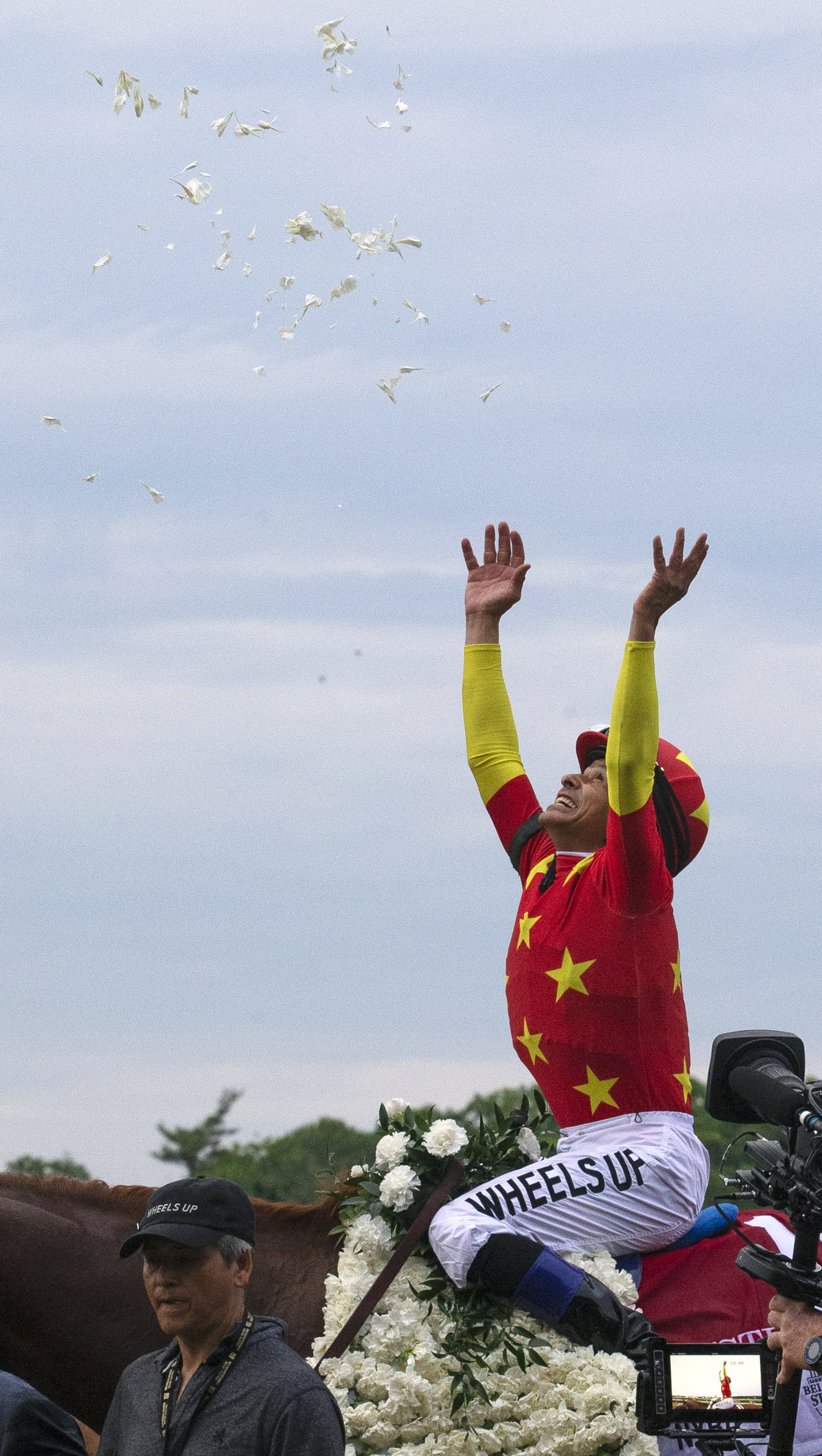 Mike Smith celebrates after winning the Belmont Stakes