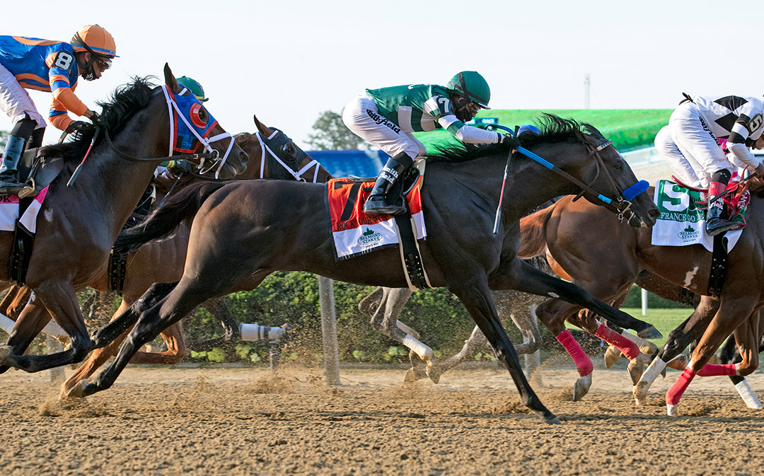 Rock Your World (No. 7) vies for position early in the Belmont Stakes at Belmont Park