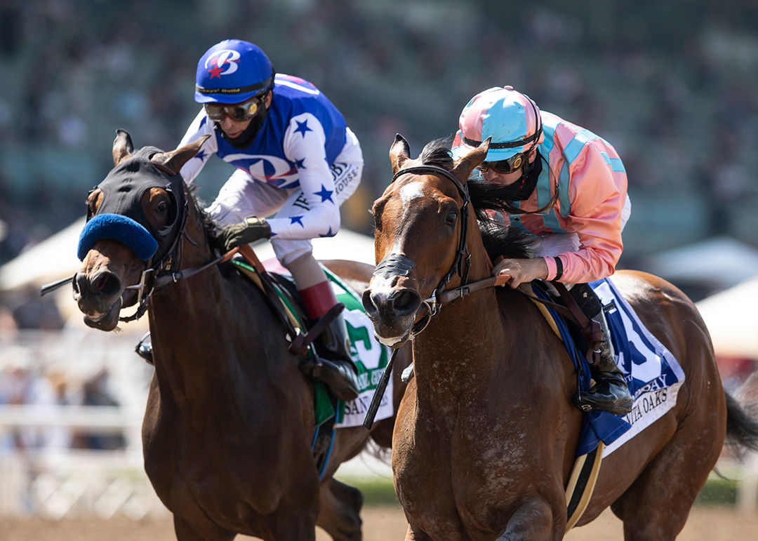 Beautiful Gift (left) finishes second in the 2021 Santa Anita Oaks