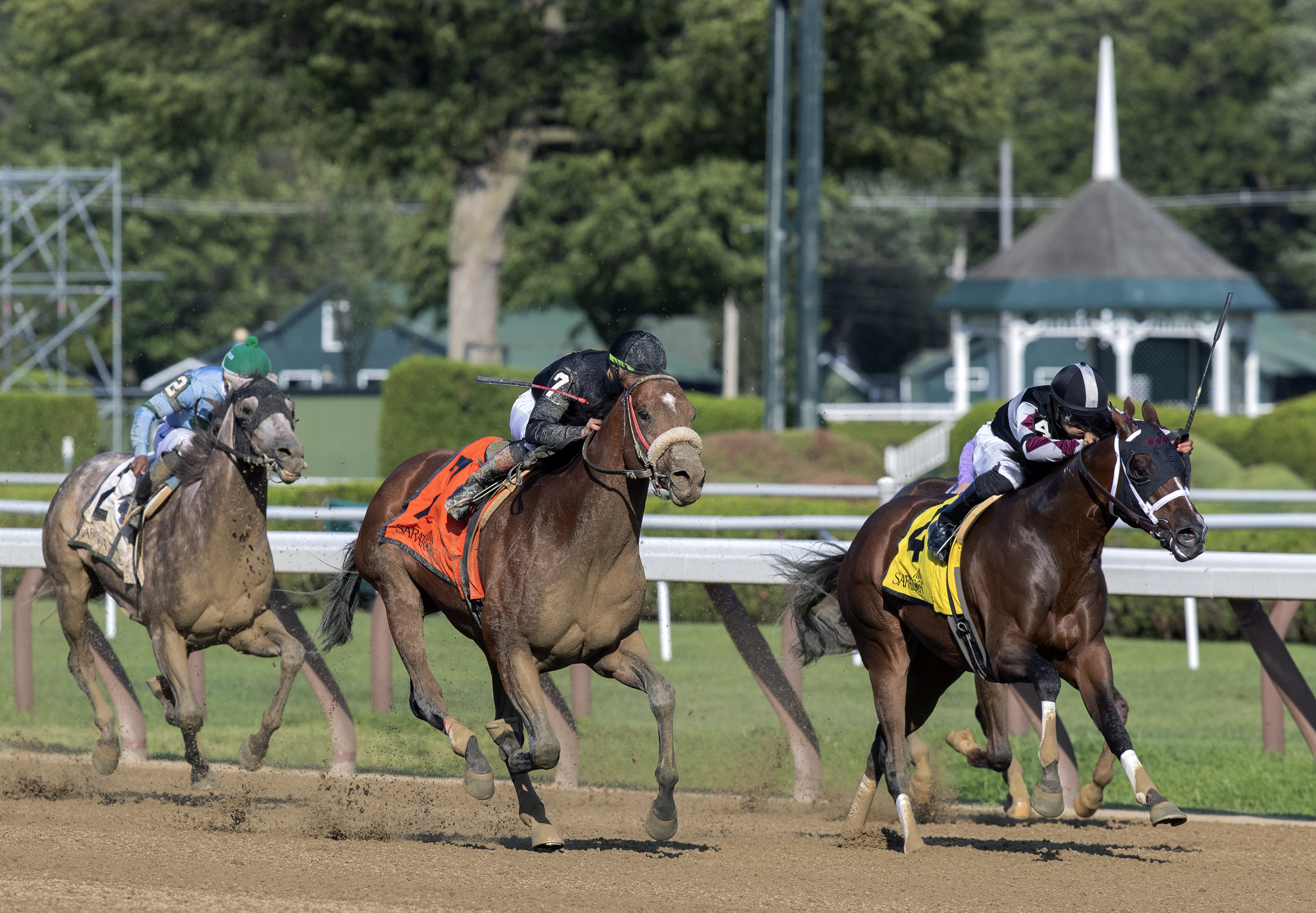 Bon Raison (left) runs by He Hate Me to win the Tale of the Cat at Saratoga on 8-9-2019.BL