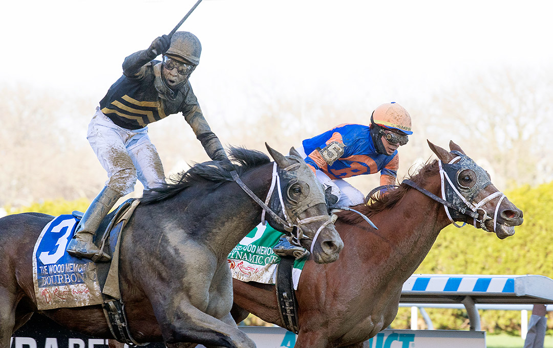 Bourbonic (left) wins the Wood Memorial at Aqueduct Racetrack