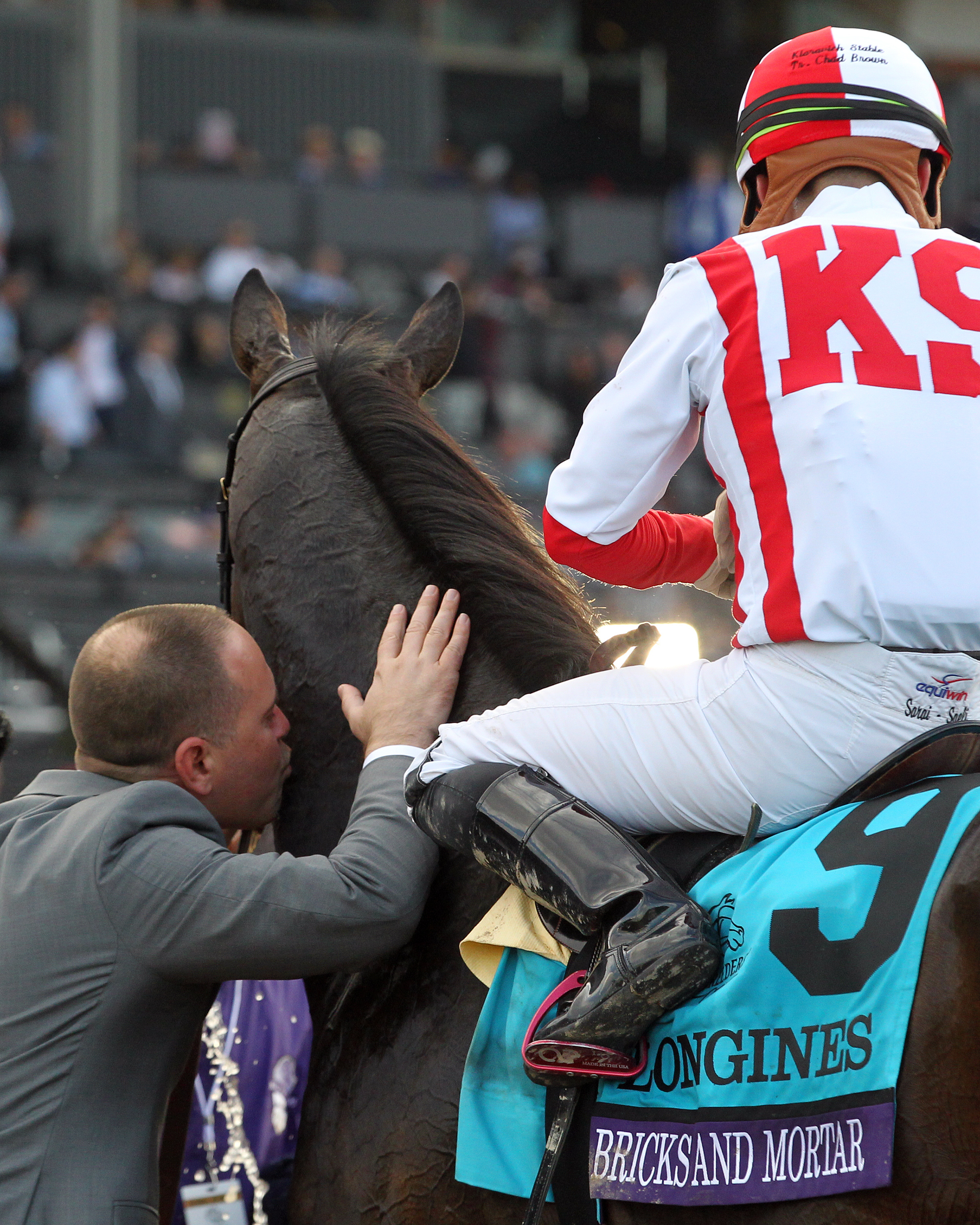 Chad Brown kisses Bricks and Mortar post 2019 BC Turf Sprint