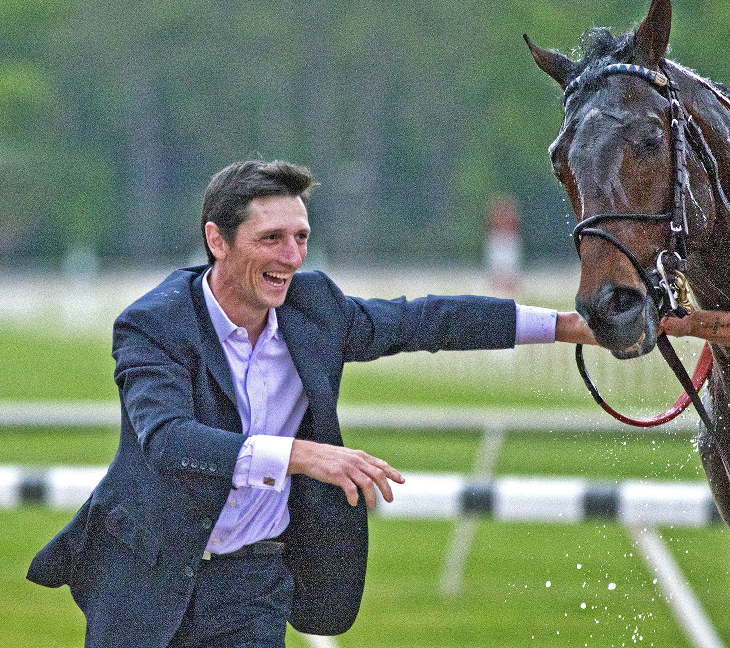 Rodolphe Brisset celebrates with Quip after winning the Tampa Bay Derby
