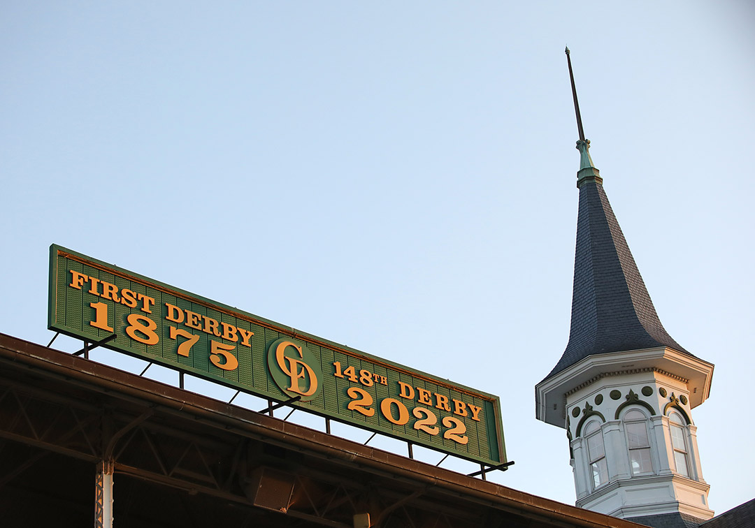 Kentucky Derby 2022 sign with spire at Churchill Downs