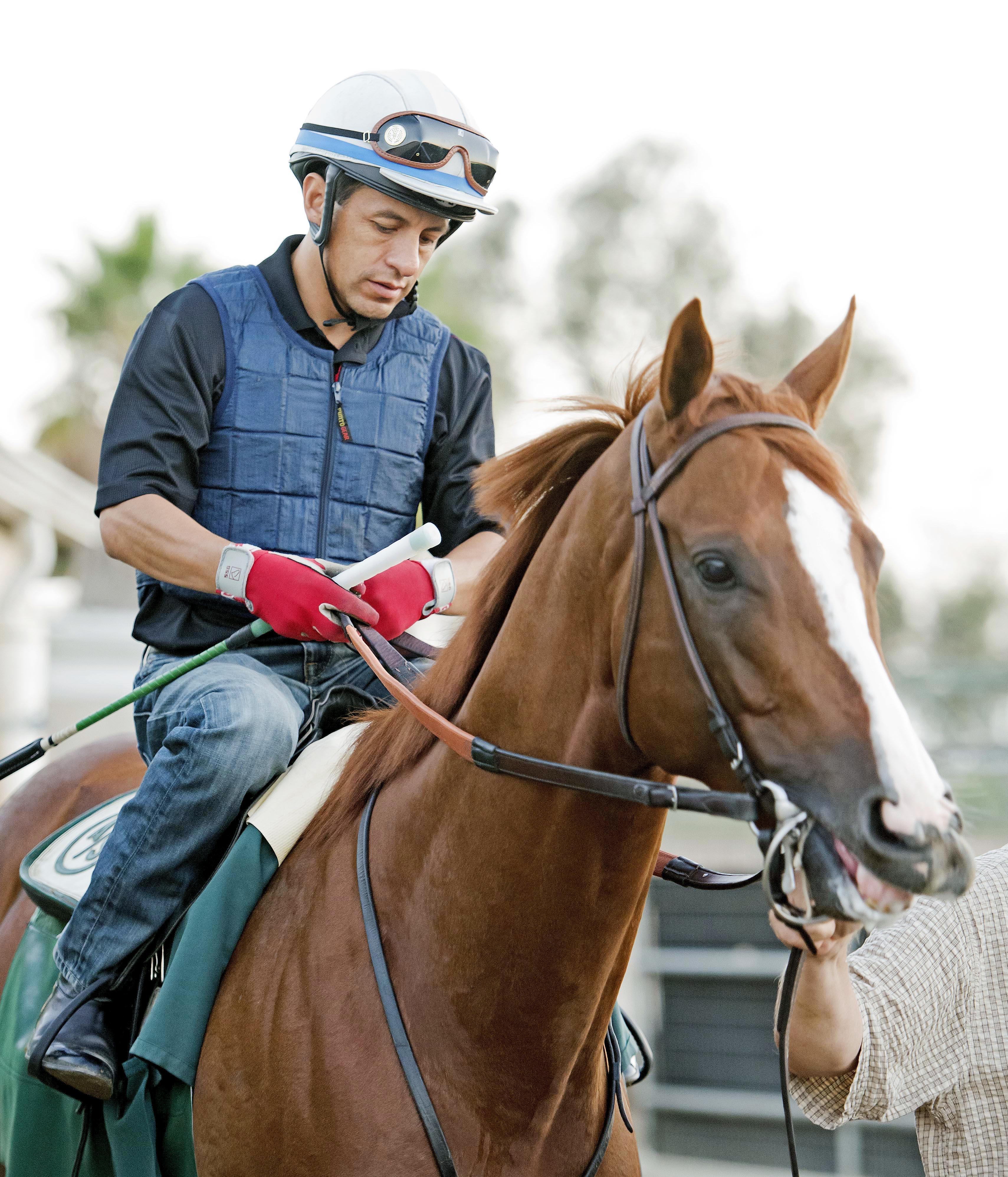 California Chrome with Victor Espinoza on Aug. 22