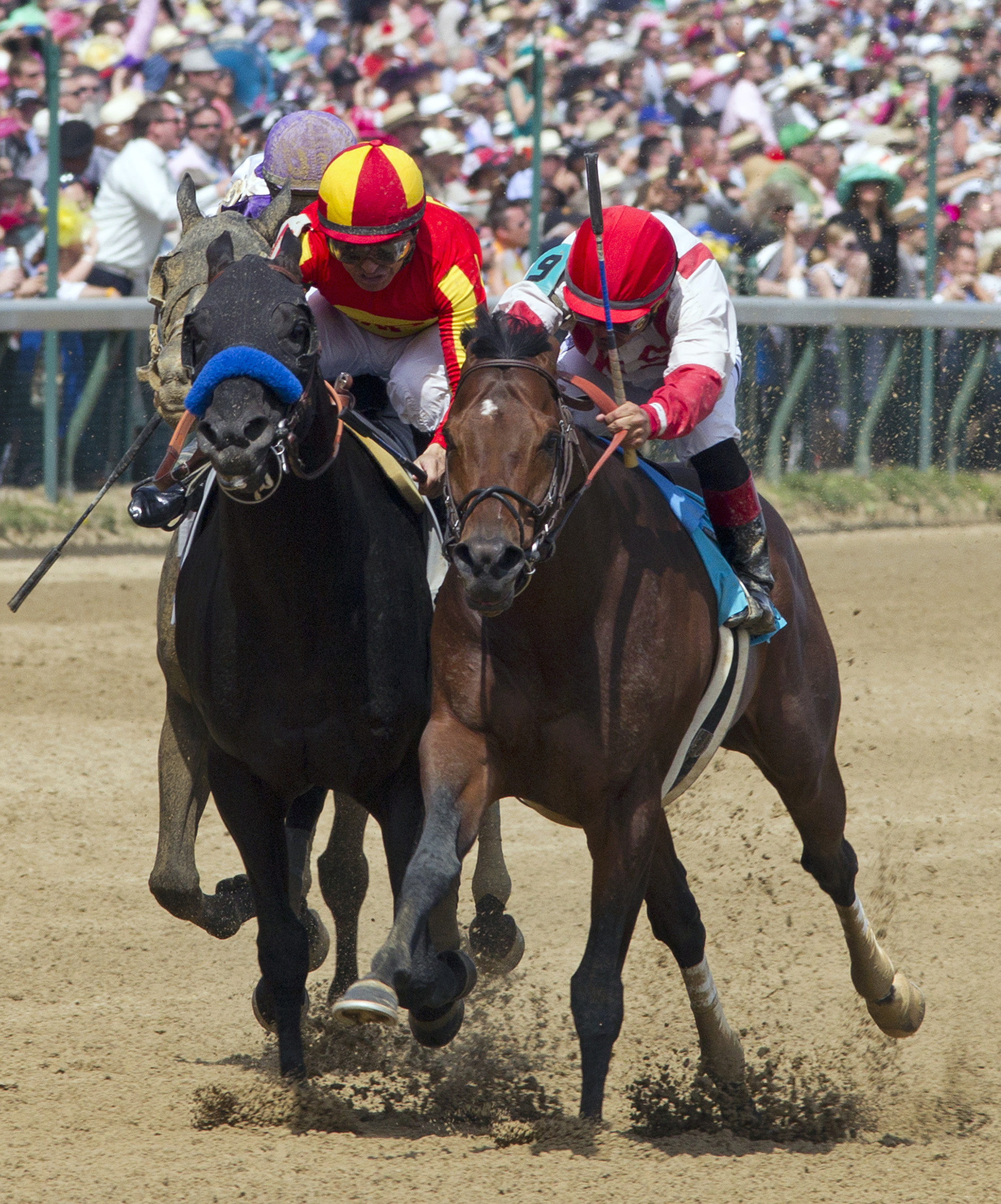 Central Banker (right) defeats Shakin It Up in Grade 2 Churchill Downs