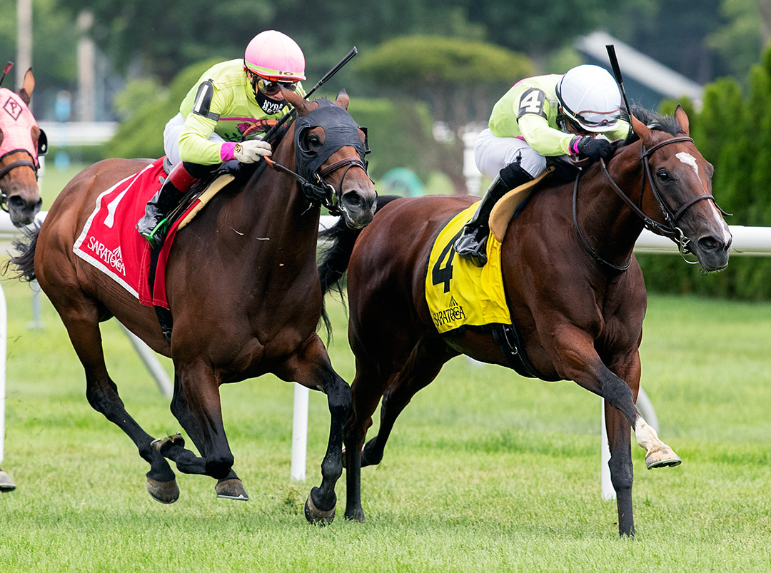 Classic Lady (right) wins the Dayatthespa over War Canoe at Saratoga Race Course