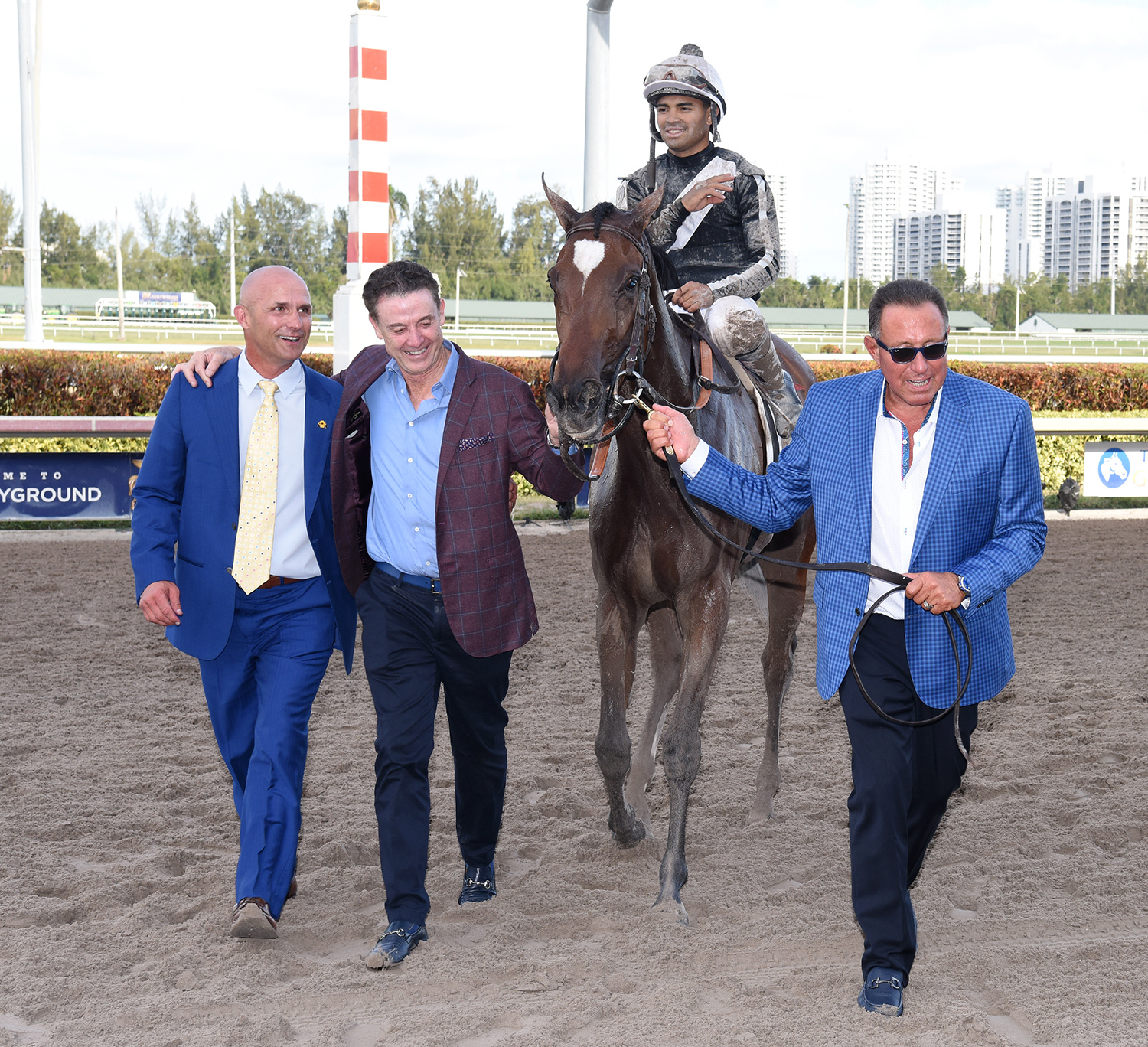Rick Pitino with Coach Rocks after the Gulfstream Park Oaks