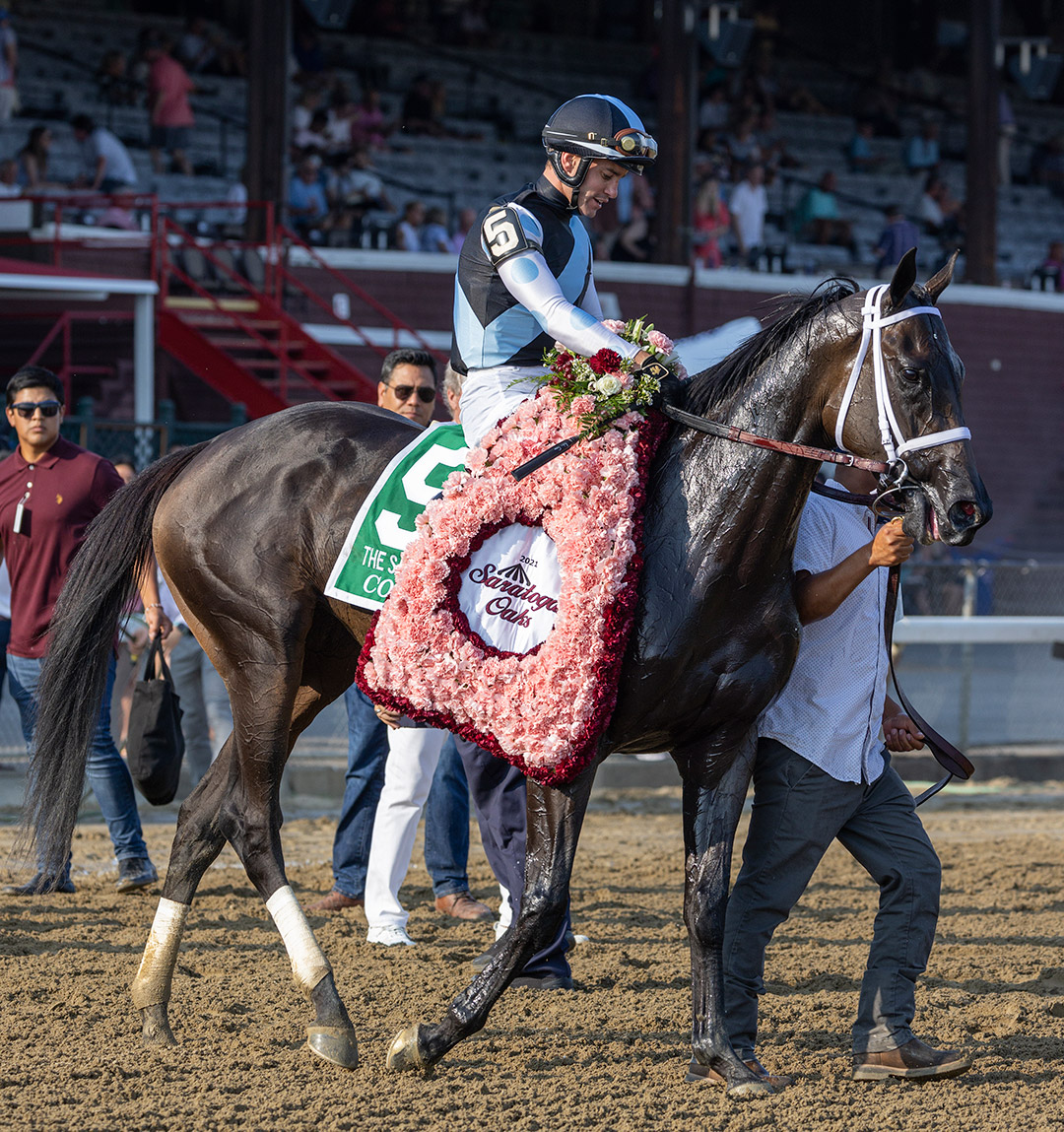 Con Lima after winning the 2021 Saratoga Oaks at Saratoga Race Course
