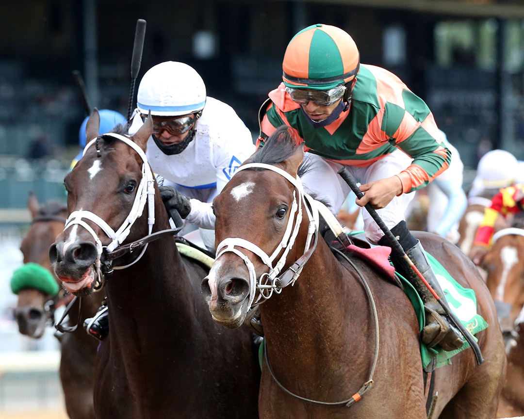 Cousin Larry (right) wins an October 2020 maiden race at Keeneland Racecourse