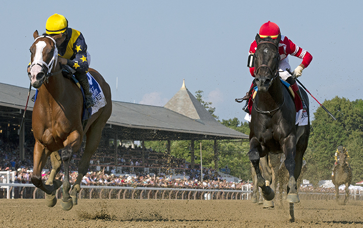 Covfefe (left) wins the Test Stakes at Saratoga Race Course