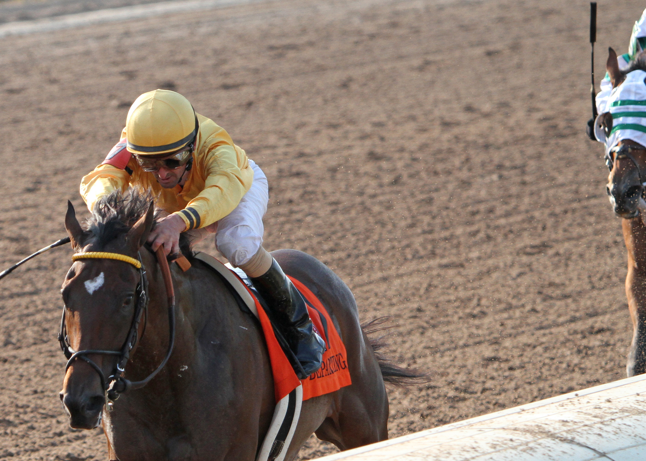 Departing wins the Super Derby