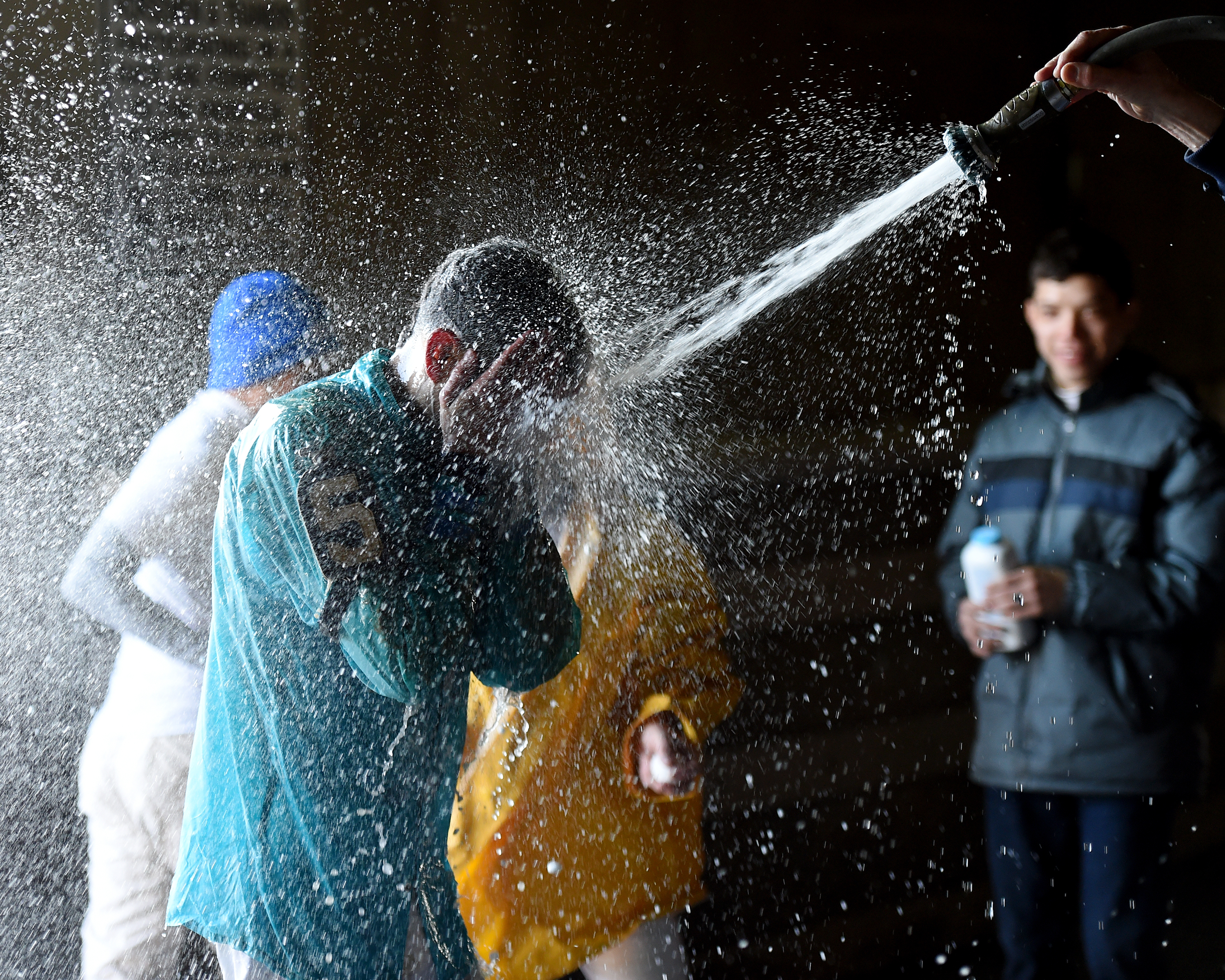 Hector Diaz get doused with water after his first win on Jan. 15