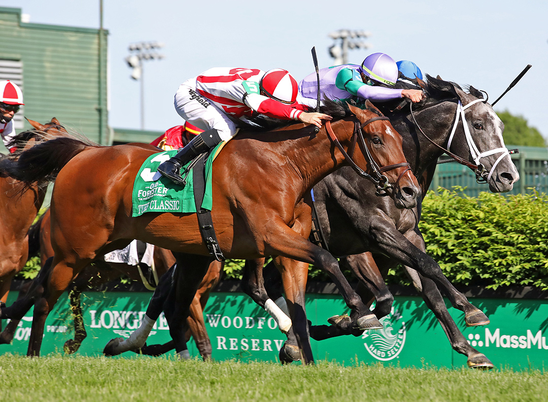 Domestic Spending (left) and Colonel Liam dead heat in the Turf Classic at Churchill Downs