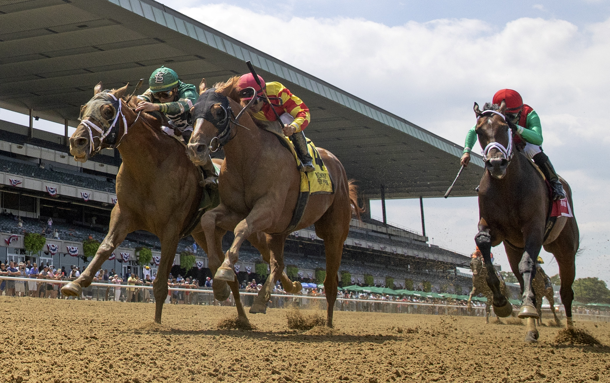 Dynamic One (left) nips First Captain (center) in the Suburban at Belmont on July 9 2022