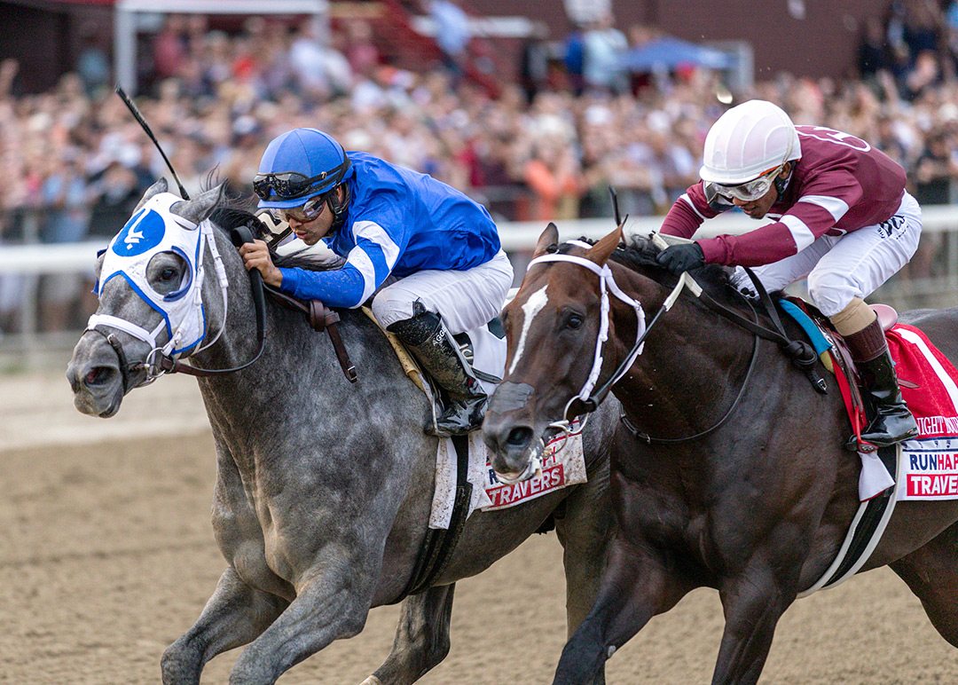 Midnight Bourbon (right) finishes second in the 2021 Travers at Saratoga