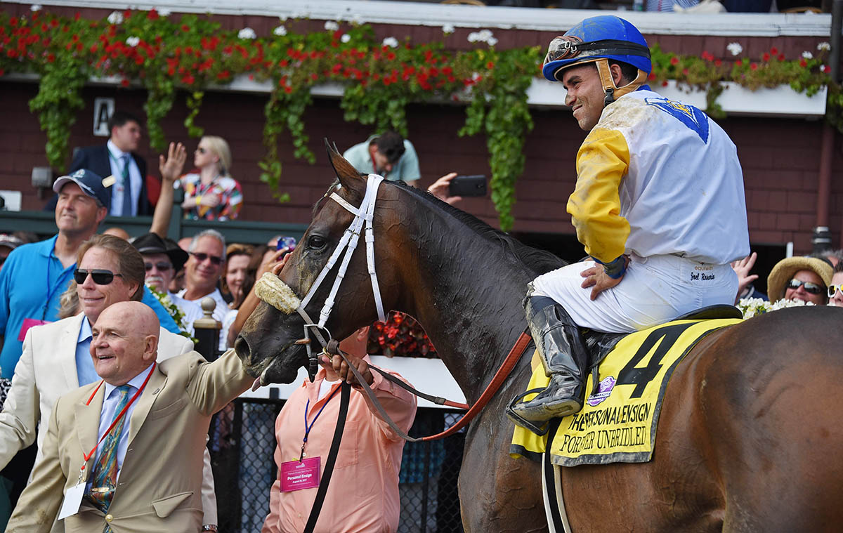 Joel Rosario aboard Forever Unbridled with Charles Fipke at the Personal Ensign