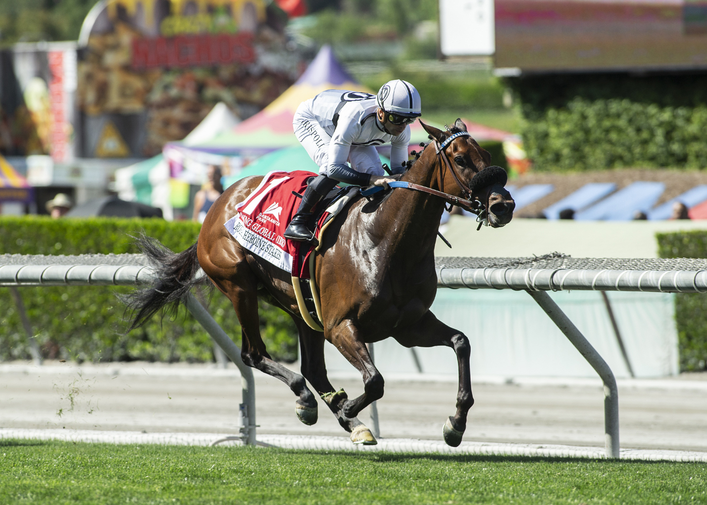 Going Global wins the Royal Heroine Stakes on April 9 2022