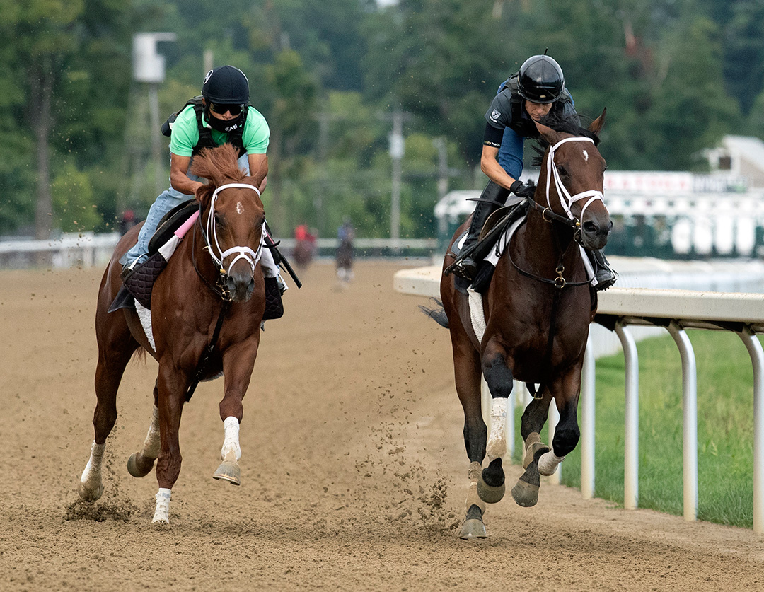 Dr Post (right) trains with Happy Saver at Saratoga on Aug. 28