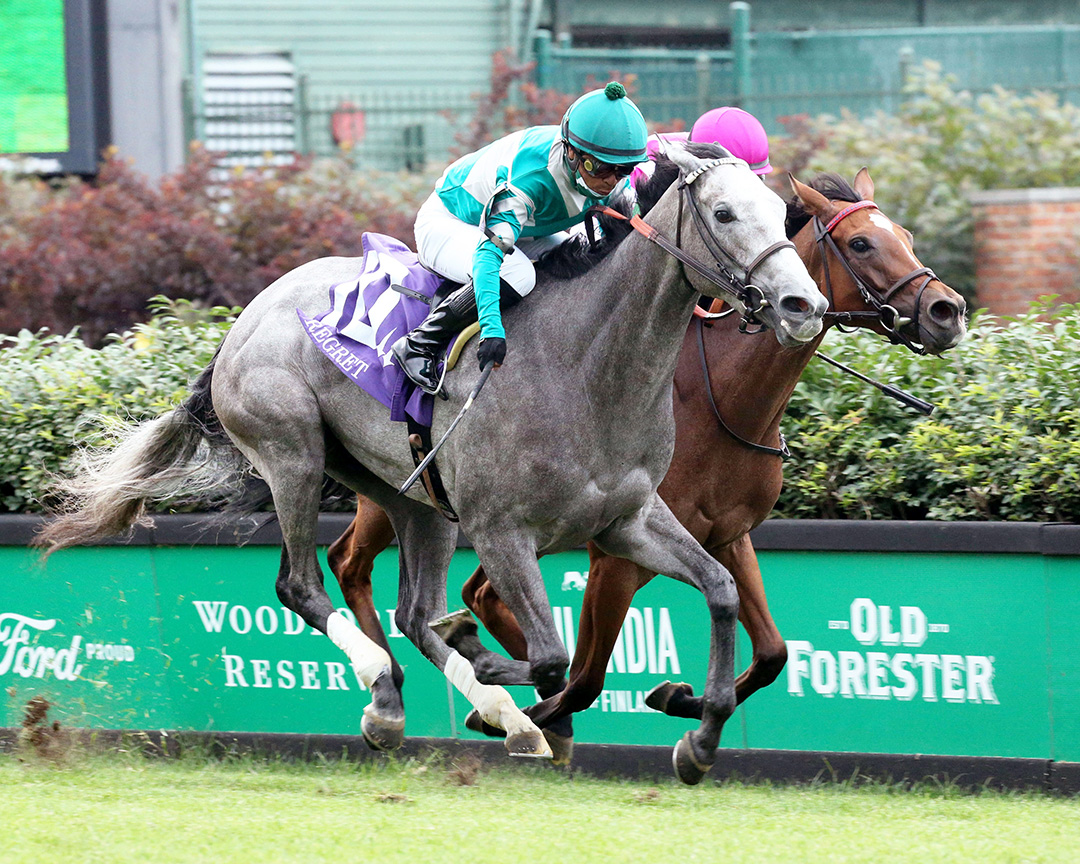 Harvey's Lil Goil (outside) wins the Regret Stakes at Churchill Downs