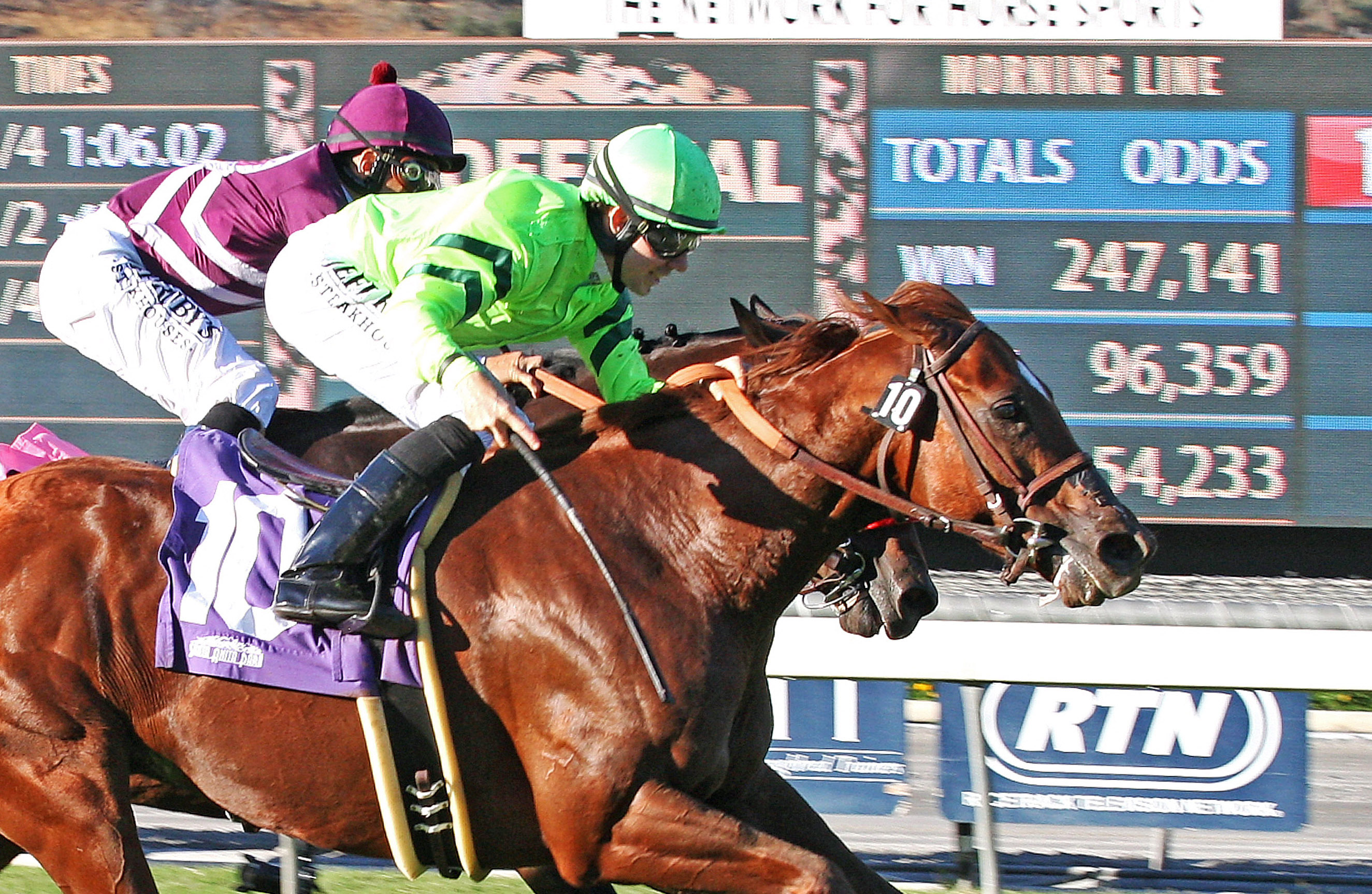 Home Run Kitten wins the Eddie D Stakes
