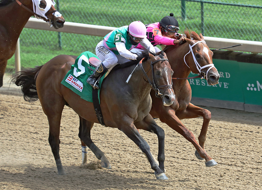 Lasting Legacy (right) is disqualified to second behind Honest Mischief in a Sept. 4 allowance at Churchill