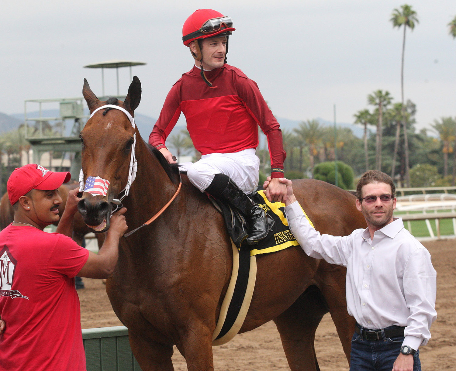 Tyler Baze and Julien Leparoux with Itsinthepost after the Charles Whittingham