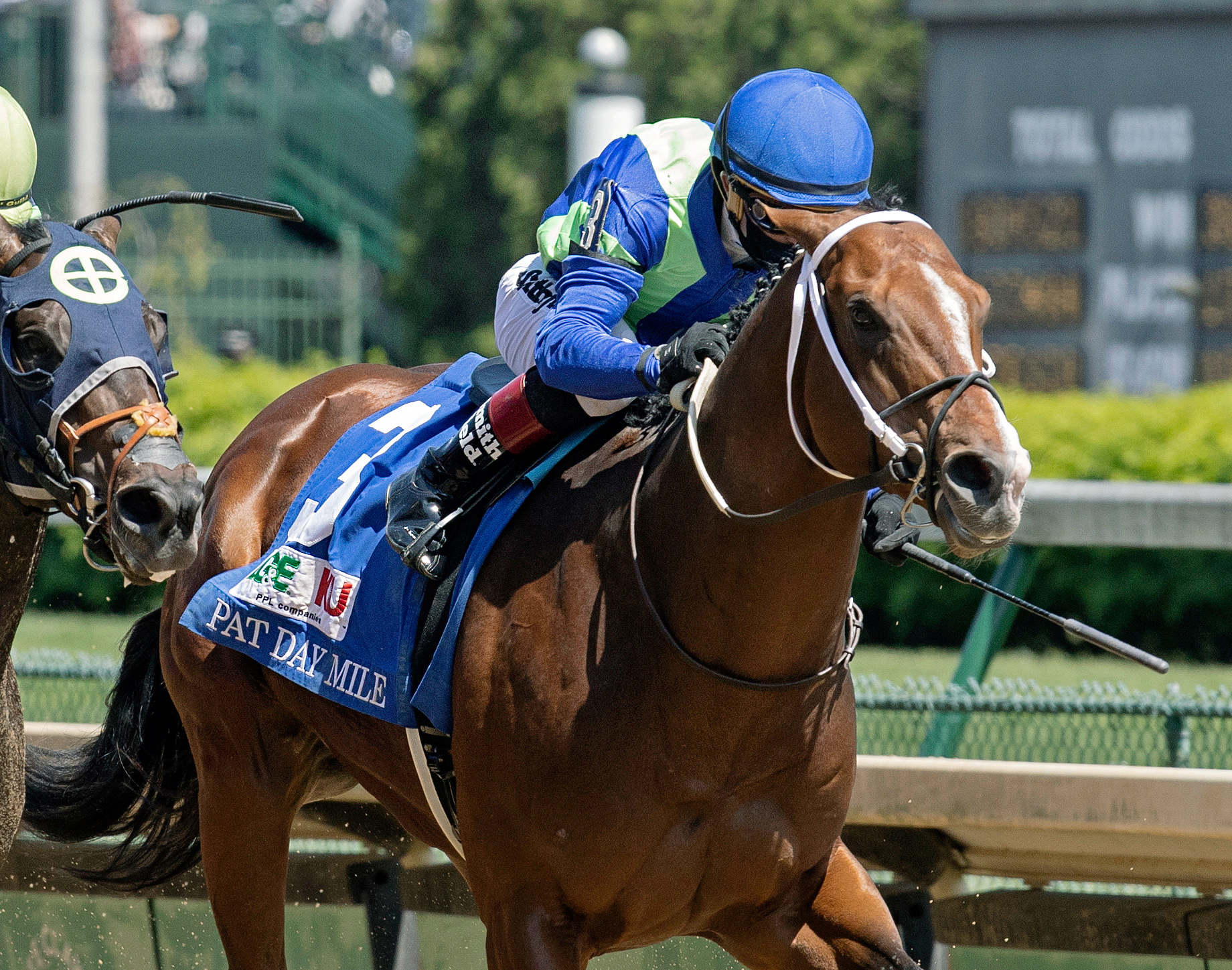 Jackie's Warrior wins the 2021 Pat Day Mile at Churchill Downs