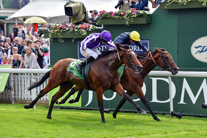 Japan (left) wins the Juddmonte International Stakes at York Racecourse