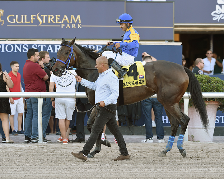 Jeltrin with trainer Alexis Delgado at the Davona Dale
