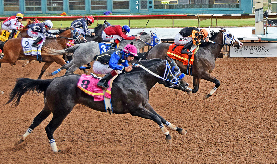 Jess Savin Candy (7) wins the Ruidoso Futurity at Ruidoso Downs