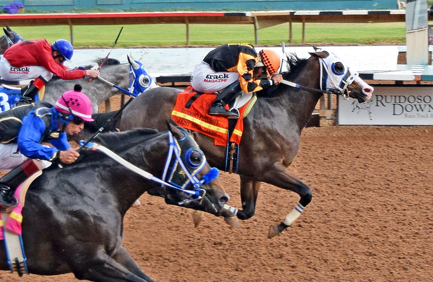 Jess Savin Candy (7) wins the Ruidoso Futurity at Ruidoso Downs