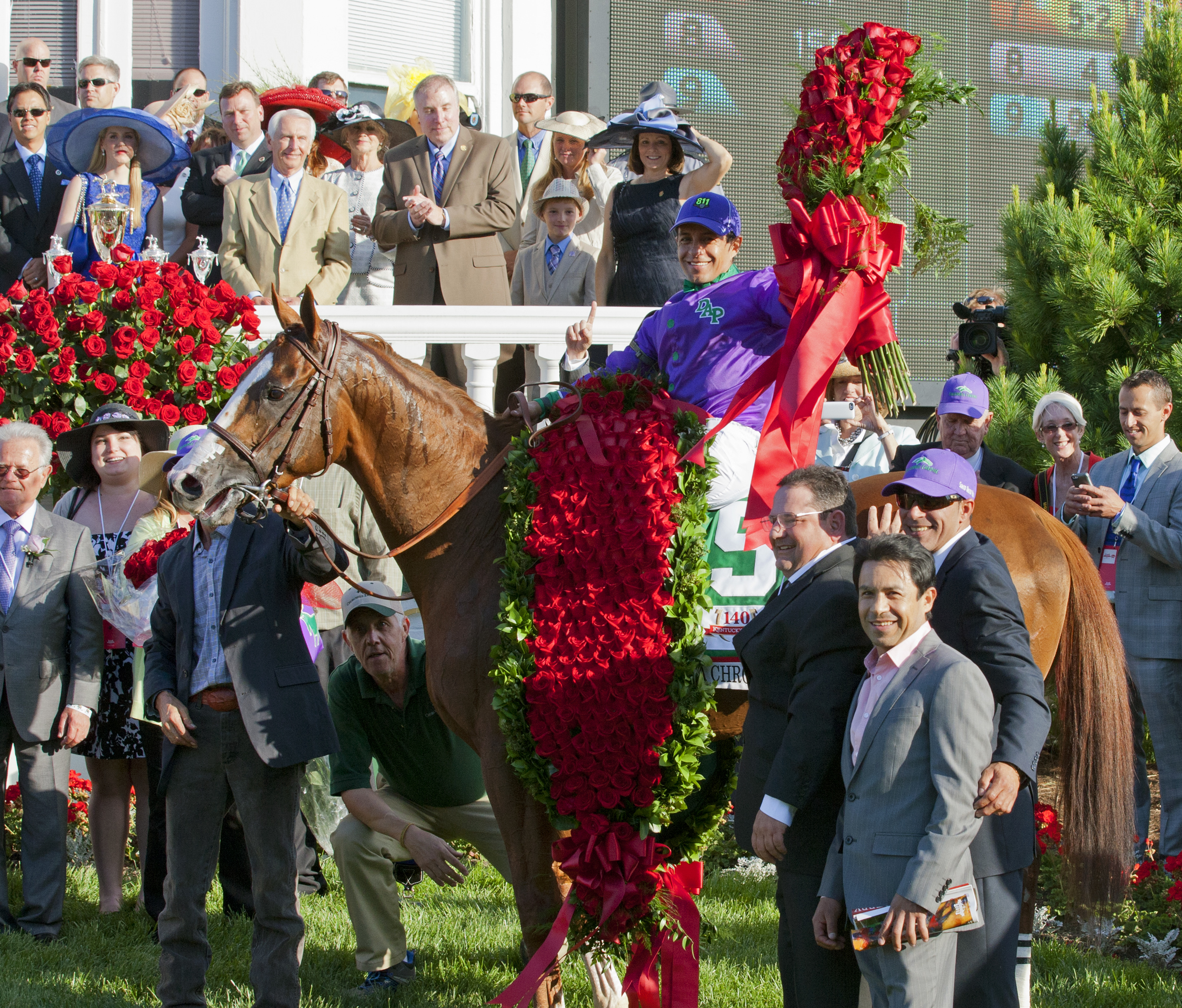 California Chrome with Jose and Victor Espinoza winner's circle