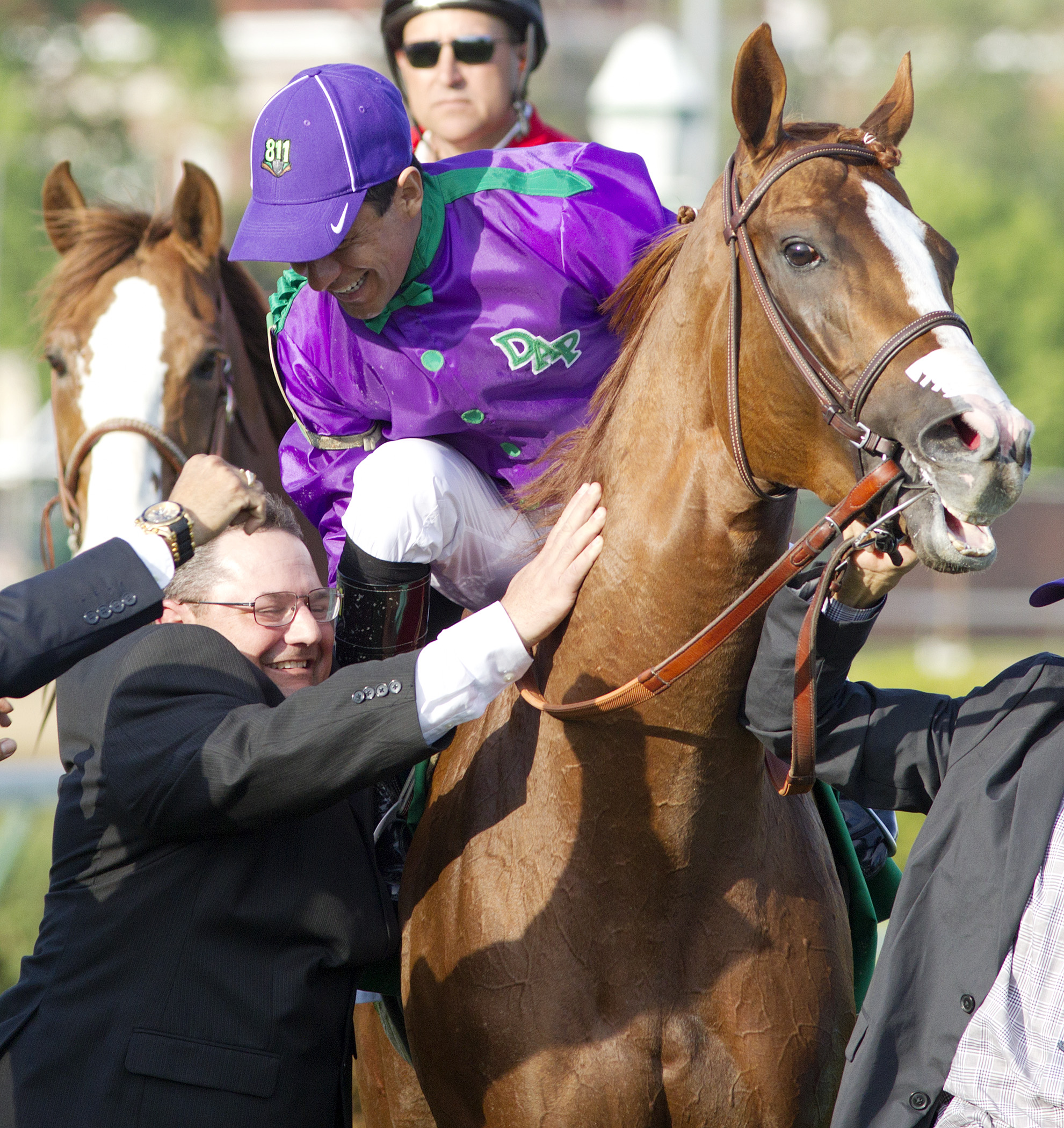 Alan Sherman with California Chrome after the Derby