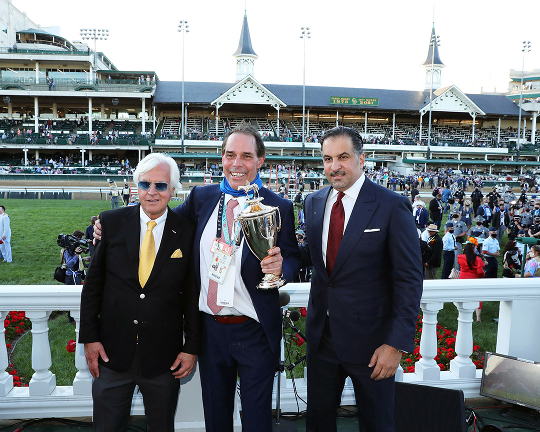 Bob Baffert (from left), Gary Young, and Amr Zedan celebrate after winning the Kentucky Derby