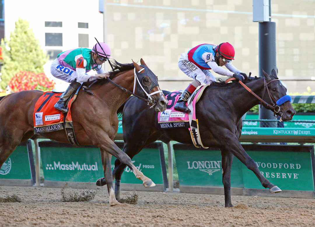 Medina Spirit (righht) wins the 2021 Kentucky Derby at Churchill Downs