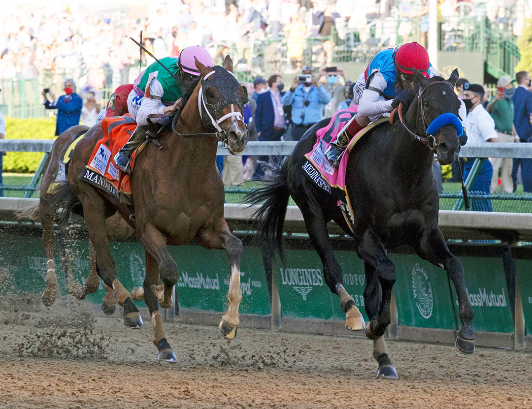 Medina Spirit (right) beats Mandaloun in the 2021 Kentucky Derby at Churchill