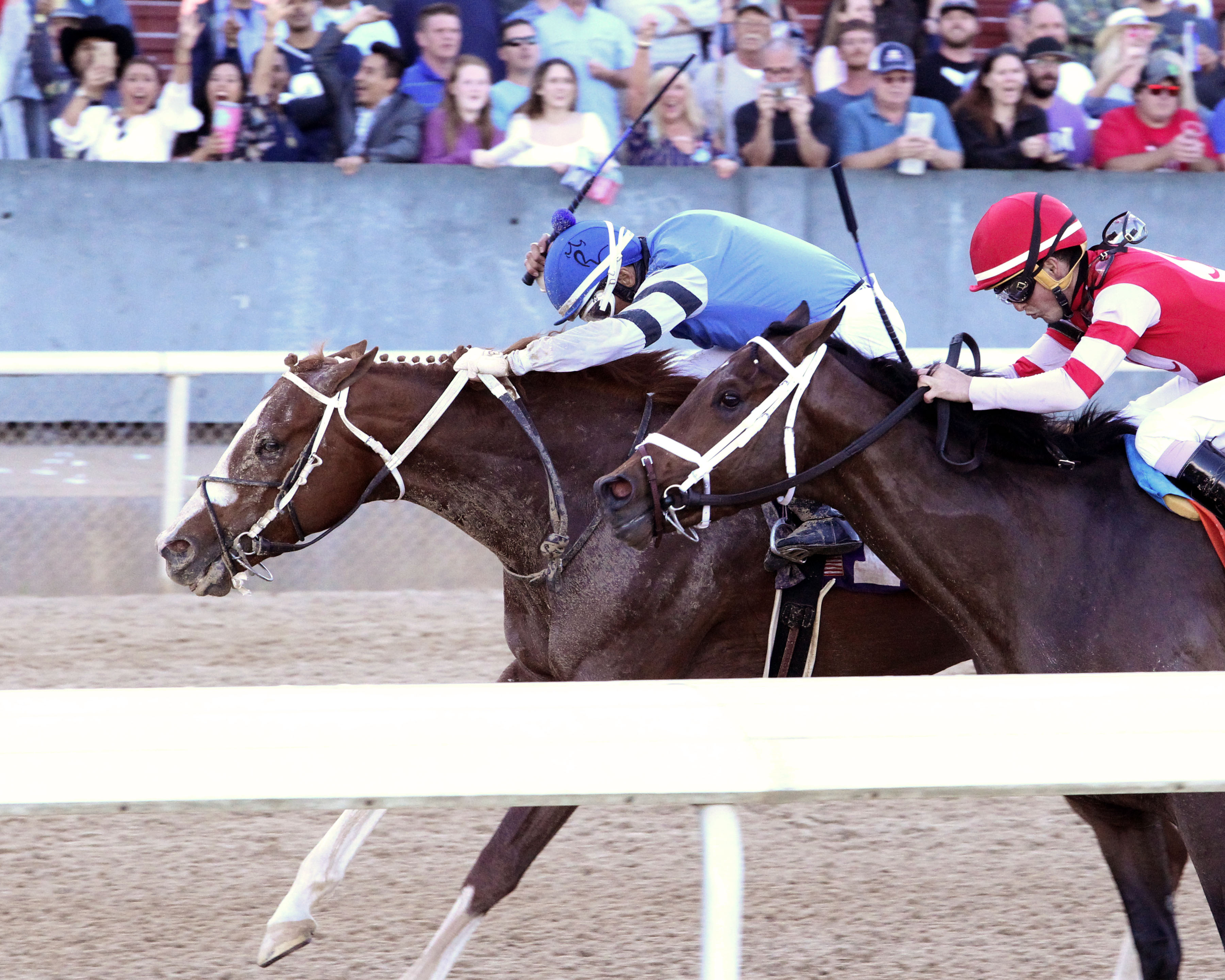 Laughing Fox (left) wins the 2019 Oaklawn Invitational