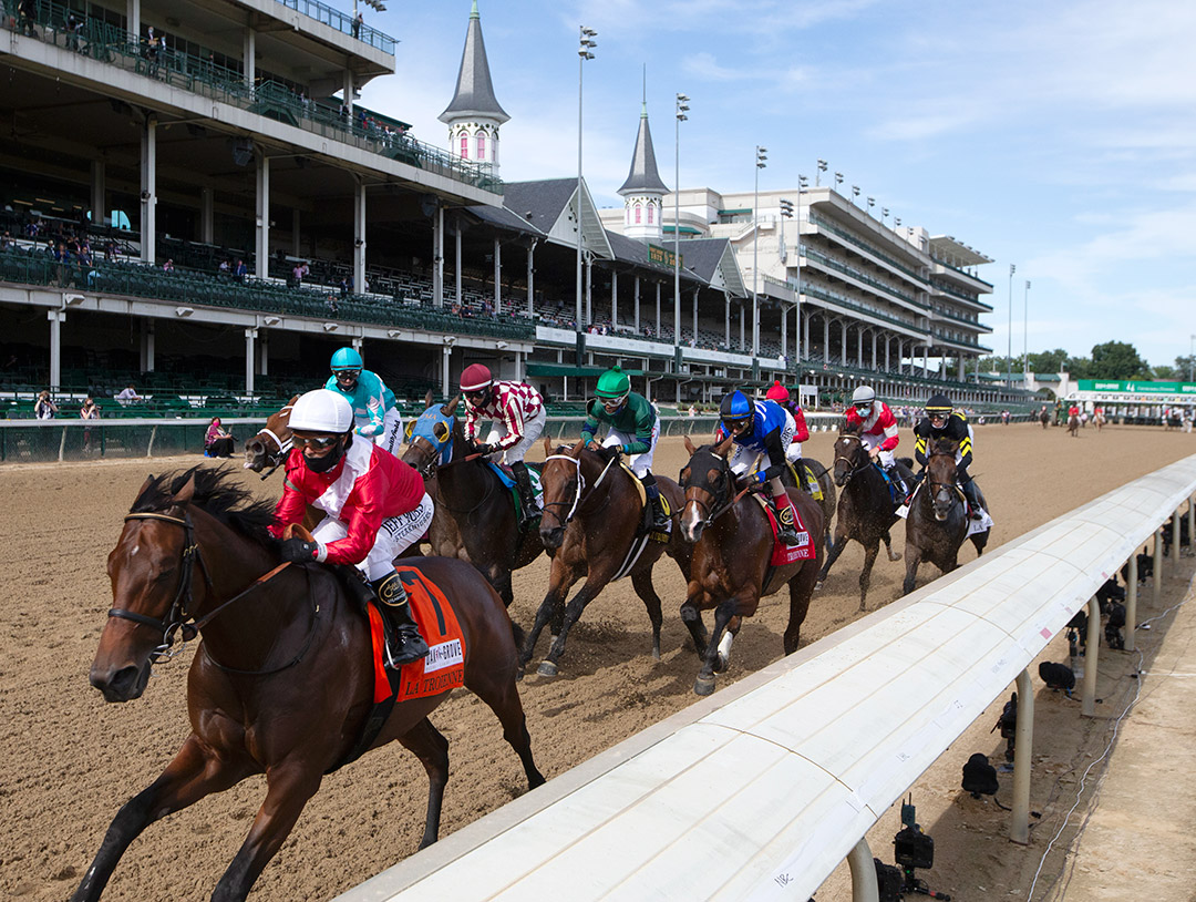 Lady Kate leads the field early in the La Troienne Stakes at Churchill Downs