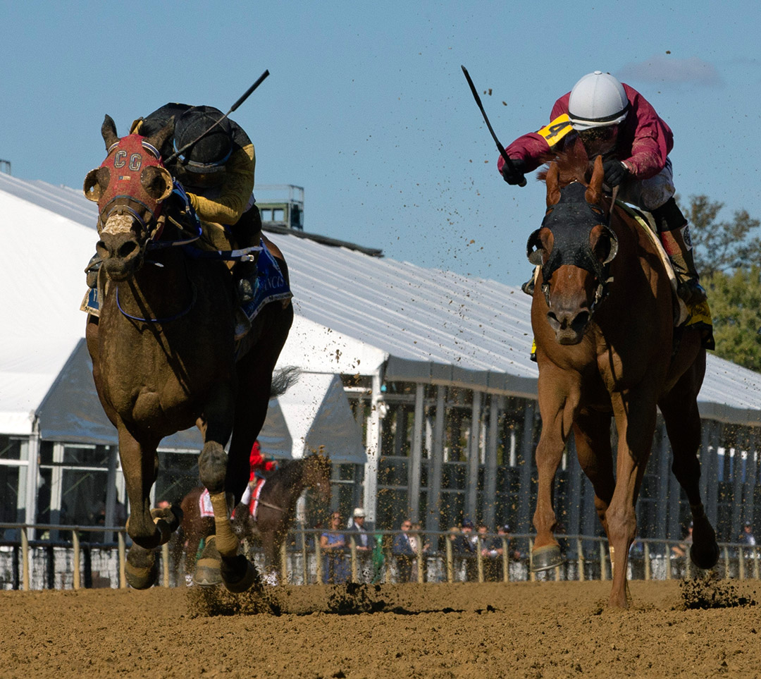 Laki (right) beats Eastern Bay (left) in the DeFrancis Dash at Laurel Park