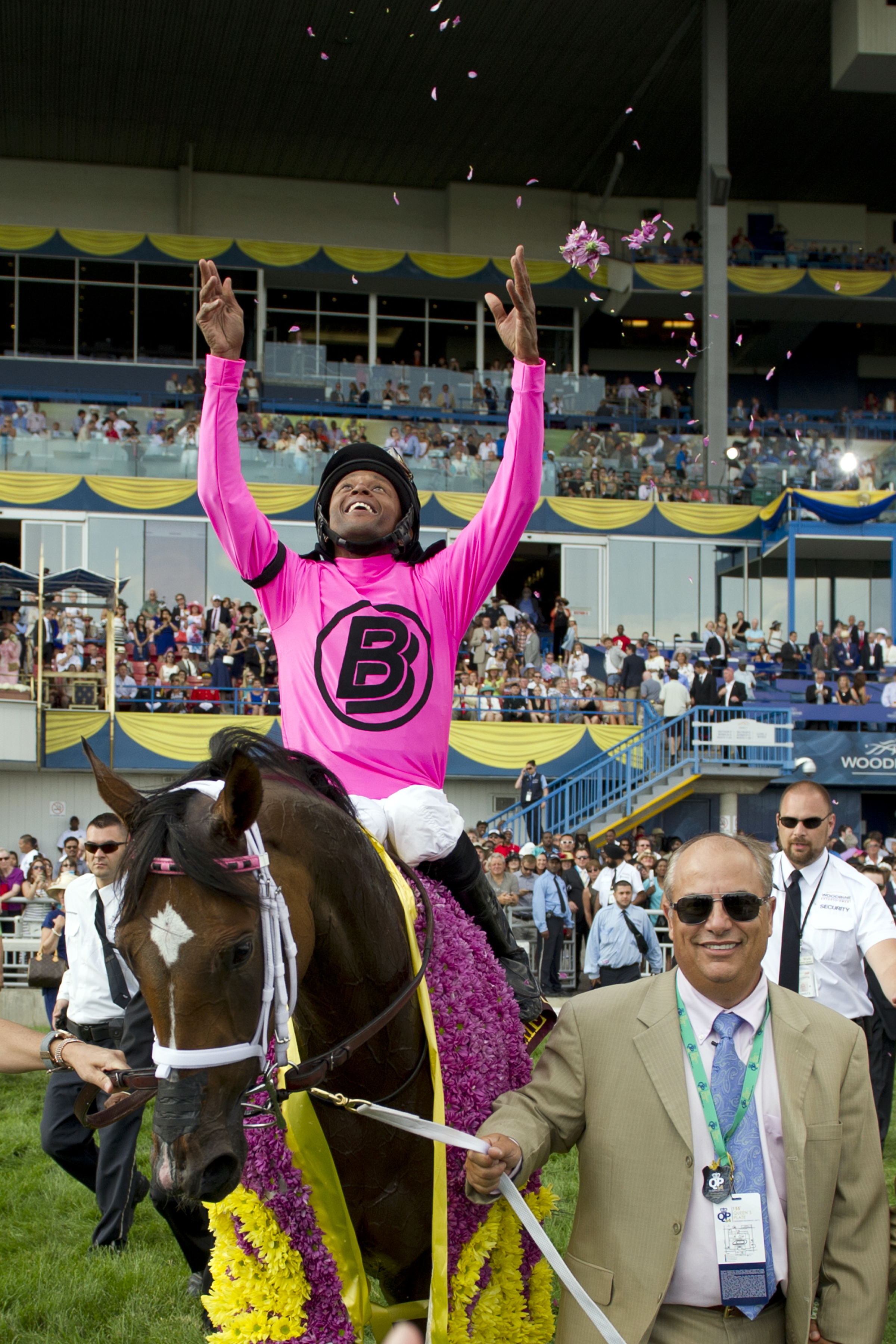 Patrick Husbands celebrates after winning the Queen's Plate