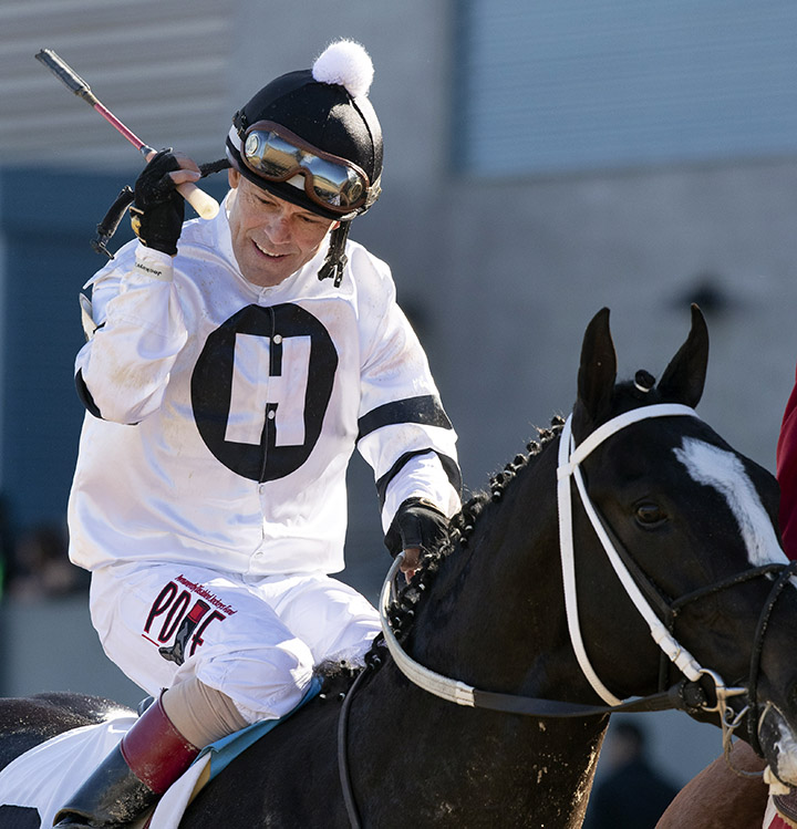 Jon Court aboard Long Range Toddy after the Rebel Stakes