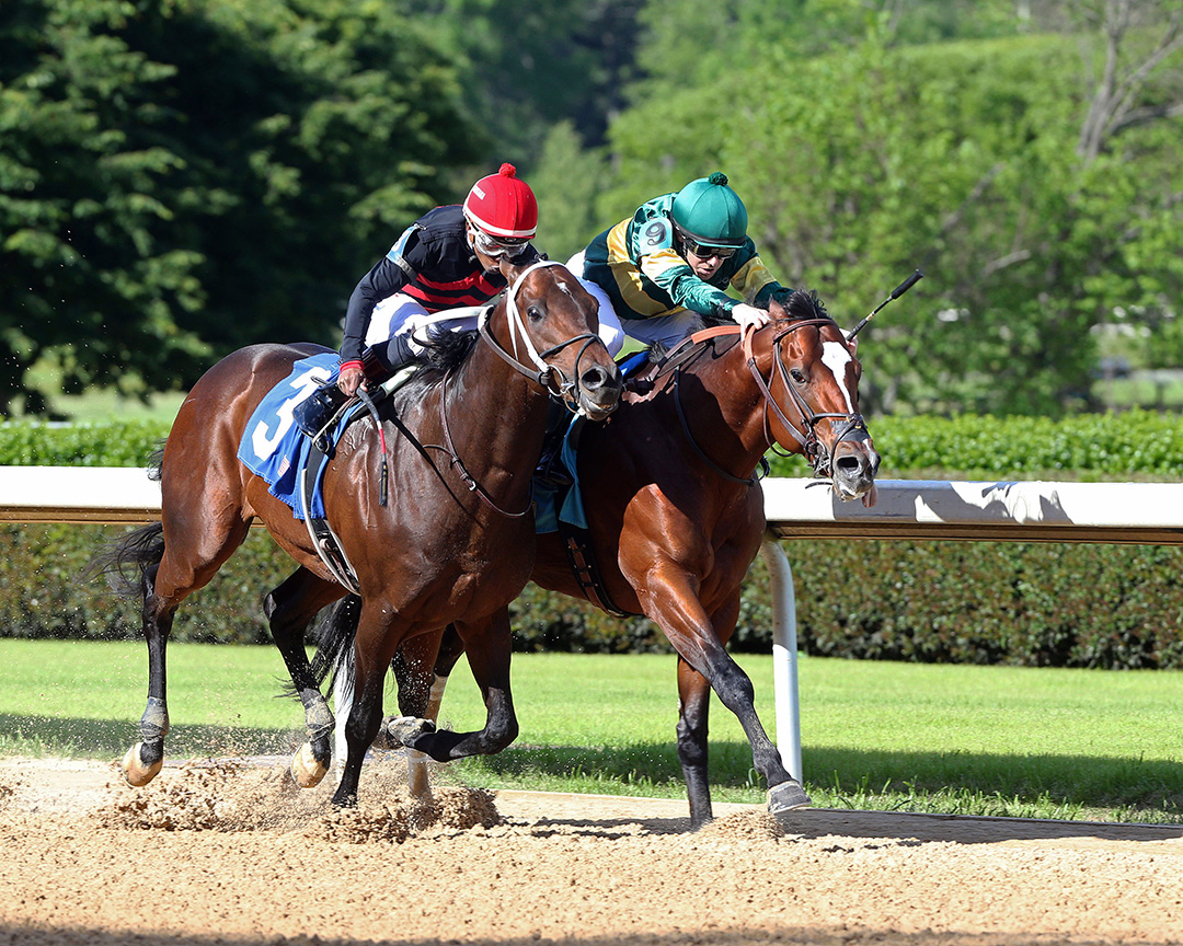 Long Weekend (right) wins the Bachelor Stakes at Oaklawn Park