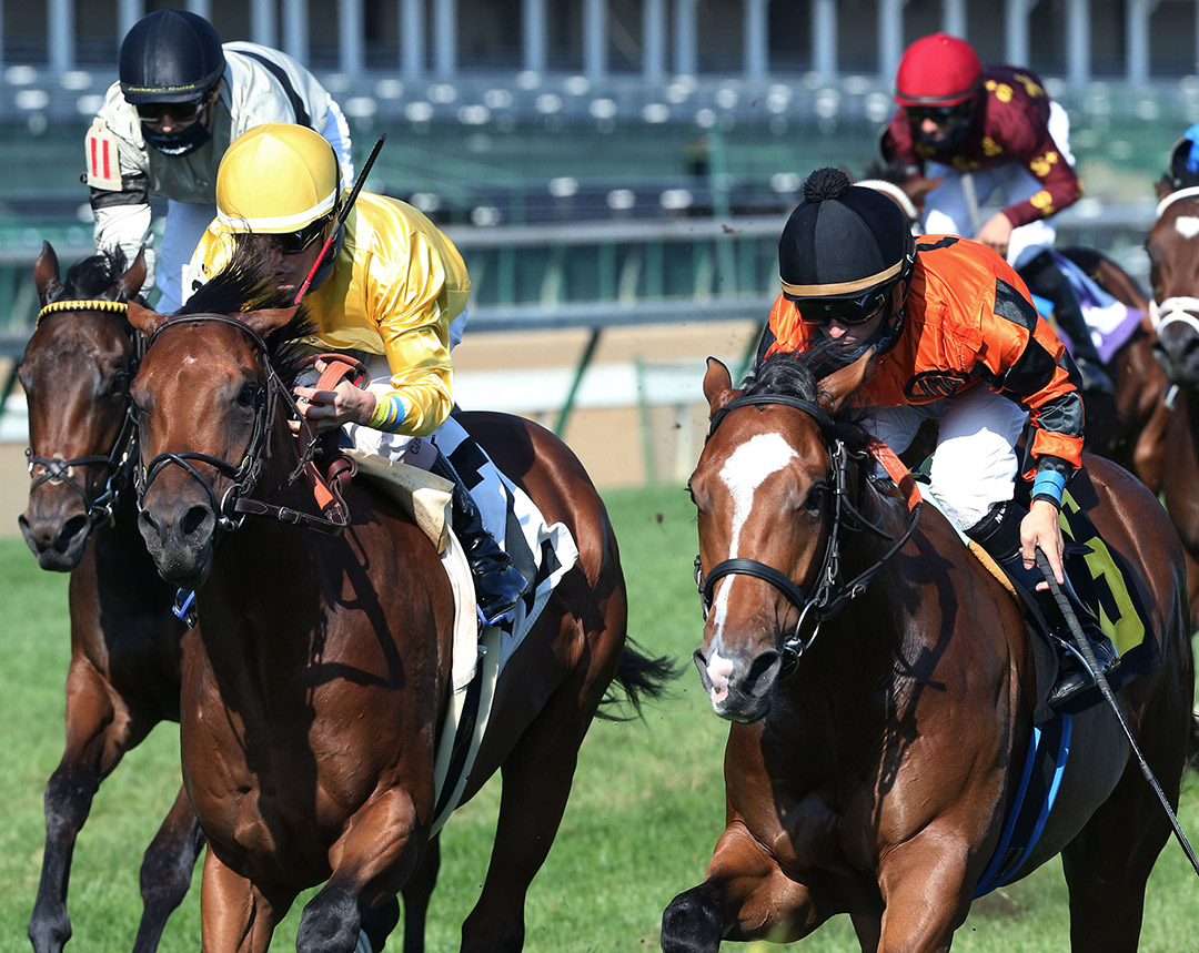 Lookin at Loki (right) wins a September 2020 maiden race at Churchill Downs
