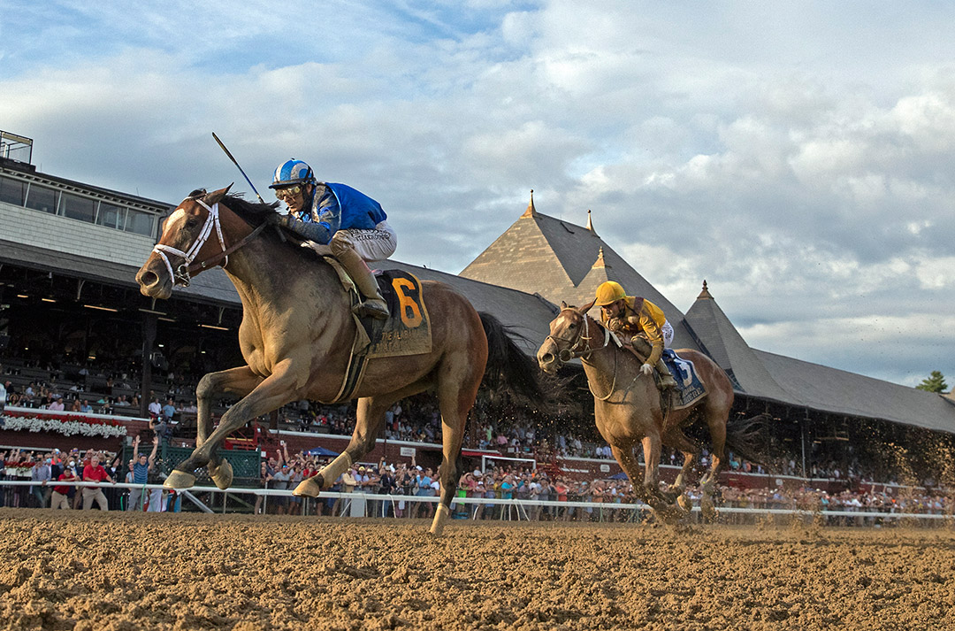 Malathaat wins the 2021 Alabama Stakes at Saratoga Race Course