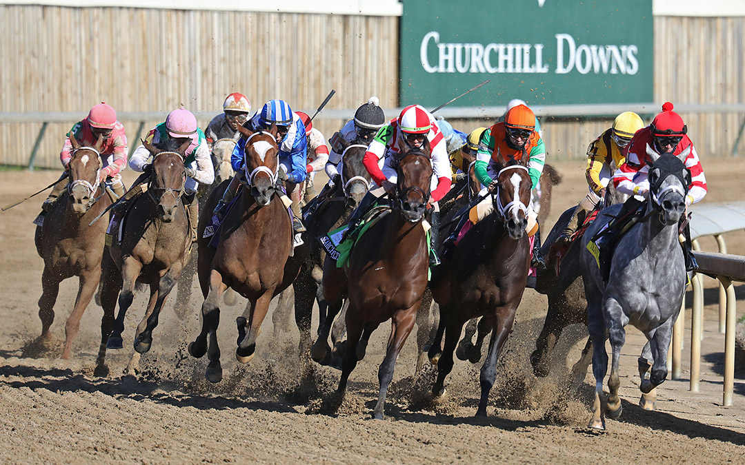 Malathaat and Kentucky Oaks field rounds the final turn at Churchill Downs